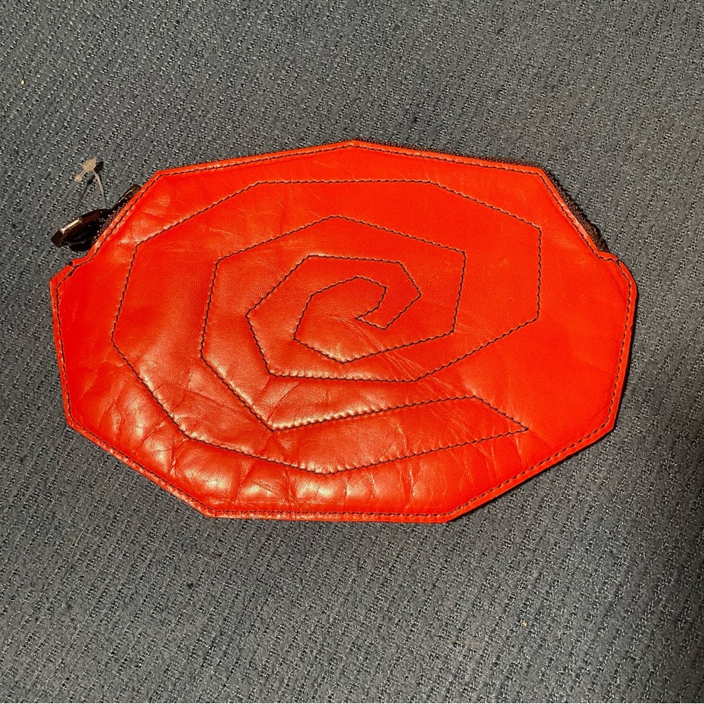 Orange leather Ursula Mascaro Logo clutch